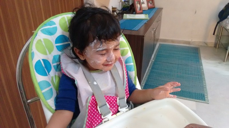 A lot of mess and a lot of fun! She loves her curd.